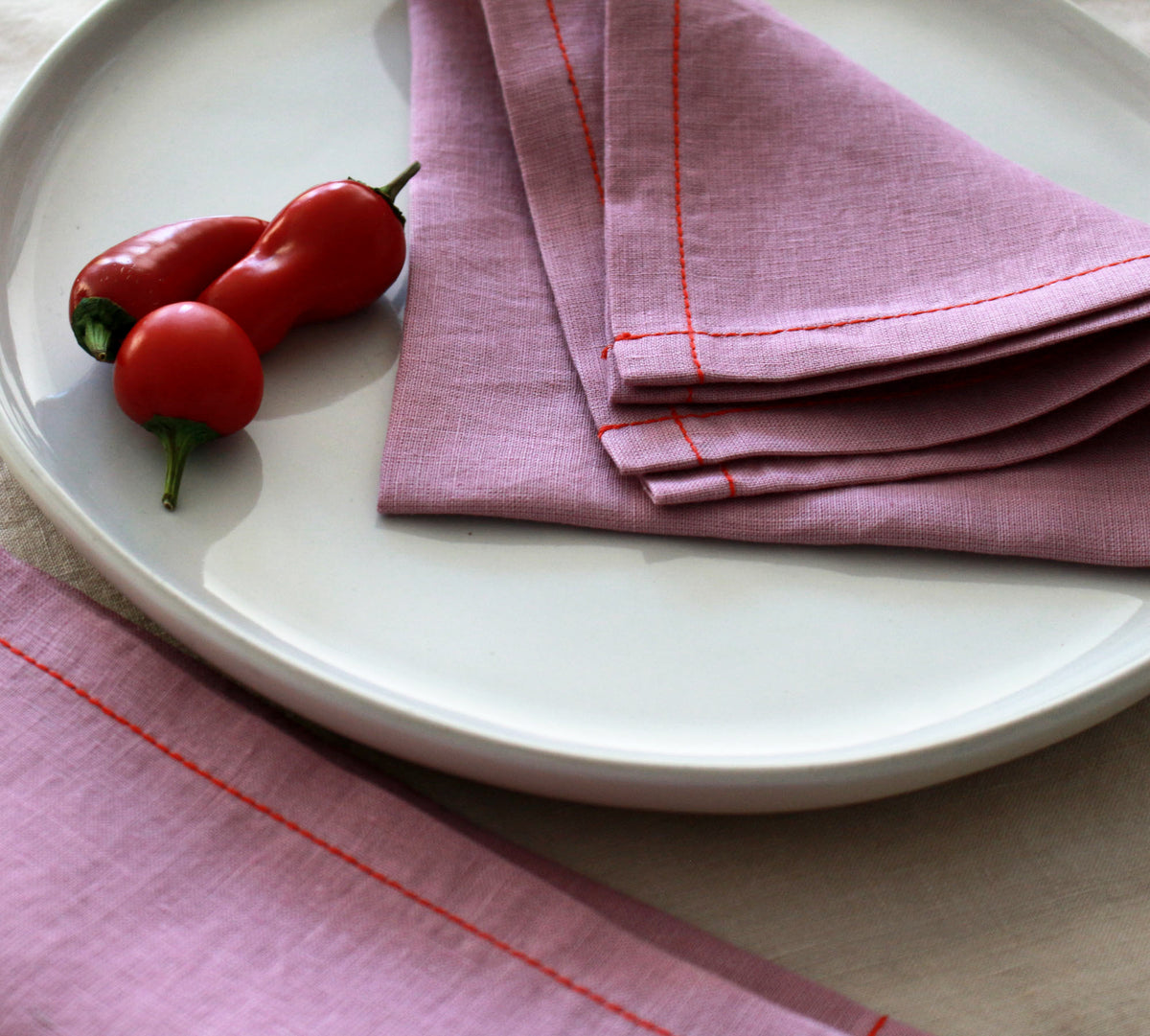 Woodrose Linen Napkin Set with Red Stitch